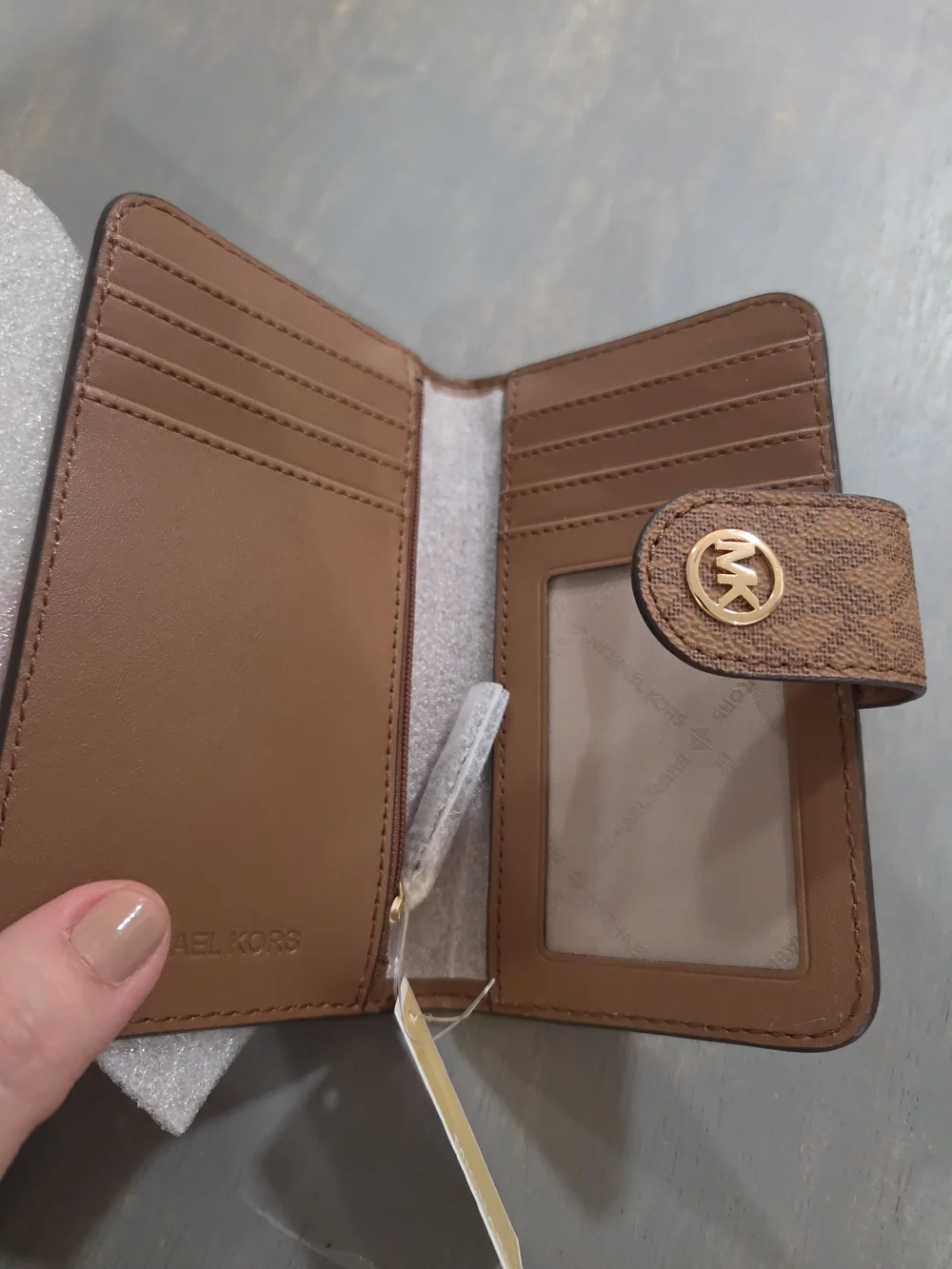 Michael Kors Brown Pebbled Leather Wallet-Style Phone Case with Gold MK Logo
